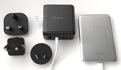 BMX GaNSTA 140W charger with worldwide AC plug adapters next to the BMX SolidSafe Air power bank.
