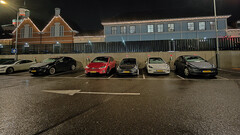 Tesla cars at a charging station