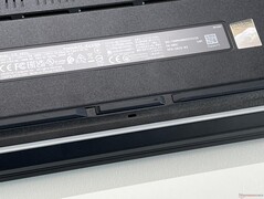 Slider for unlocking the base plate