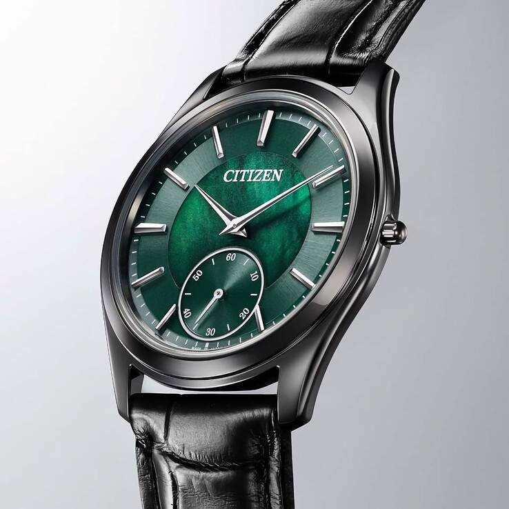 Side view highlighting the watch’s exceptionally thin 4.5mm case and black leather strap.