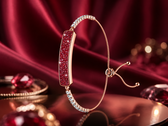 The Inllie Luna Light bracelet in gold finish with red moissanite accents 