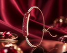 The Inllie Luna Light bracelet in gold finish with red moissanite accents