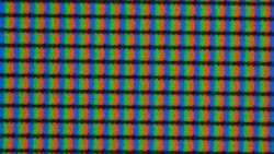 The subpixel grid is slightly blurred under the matte display surface.