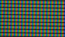 The subpixel grid is slightly blurred under the matte display surface.