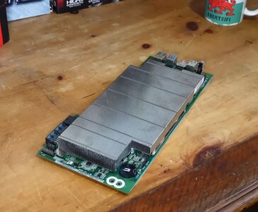 AMD BC250 board featuring a large passive heatsink. (Image source: Budget-Builds Official via YouTube)