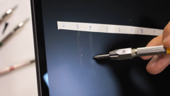 Scratches at a level 3, with...wait, what?! (Source: JerryRigEverything via YouTube)