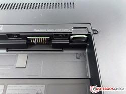 The slot for the SIM card is located inside the battery tray.