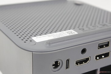 The screws are protected by circular rubber inserts