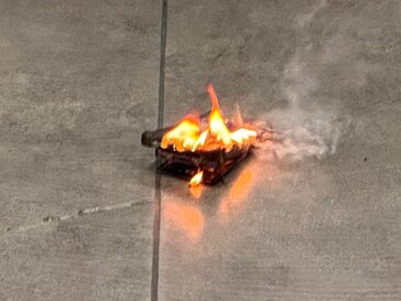 The user's Galaxy S24 on fire after emiting smoke and popping sounds.