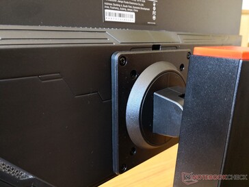 Four screws secure the base to the display portion