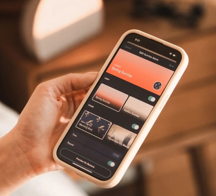 The Restore 2 smartphone app allows users to select the wake-up light of their choice along with sleep sounds, including the KFC Rain ASMR recording. (Image source: Hatch)