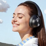 OneOdio releases the Focus A1 Pro headphones with hybrid active noise cancellation. A person wearing the headphones pictured. (Image source: OneOdio)