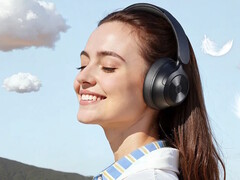OneOdio releases the Focus A1 Pro headphones with hybrid active noise cancellation. A person wearing the headphones pictured. (Image source: OneOdio)