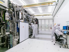 Russia targets 28-nanometer chip production by 2030, but gaps remain. Pictured: ASML clean room with engineers working on photolithography equipment (Image source: ASML)