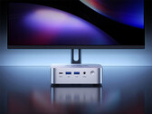 The W1-5400U has a starting launch price of around $234. Pictured: a promo image showing the mini PC in front of a monitor.