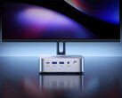 The W1-5400U has a starting launch price of around $234. Pictured: a promo image showing the mini PC in front of a monitor.