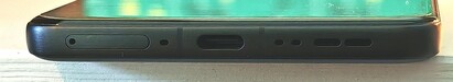 Bottom: SIM slot, microphone, USB-C port, microphone, speaker
