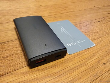 Baseus adapter next to a standard credit card