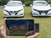 One vehicle is treated with Nissan's cool paint, the other with traditional automotive paint. The cool paint has shown up to a 12-degree Celsius reduction in exterior surface temperatures and up to 5-degree Celsius cooler interior. (Image source: Nissan)