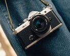 OM System OM-3 camera in silver and black