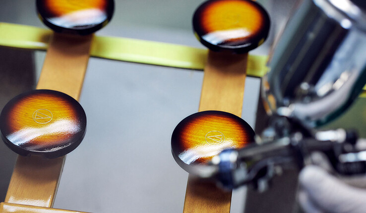 The Audio-Technica ATH-WP900SE solid ash earcups are finished by Fujigen.