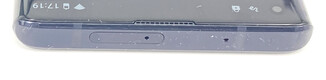 Top: microphone, SIM tray