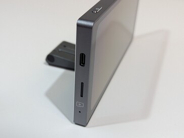 The ports and power button are on the left side. 32 GB MicroSD card included