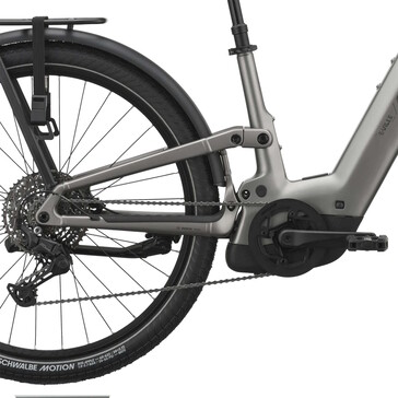 A mid-drive motor is fitted, but a proper chain guard is missing