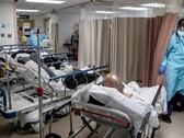 A ward of Corona virus patients in Brooklyn, March 2020 (Image source: Victor Blue and The New York Times; cropped)